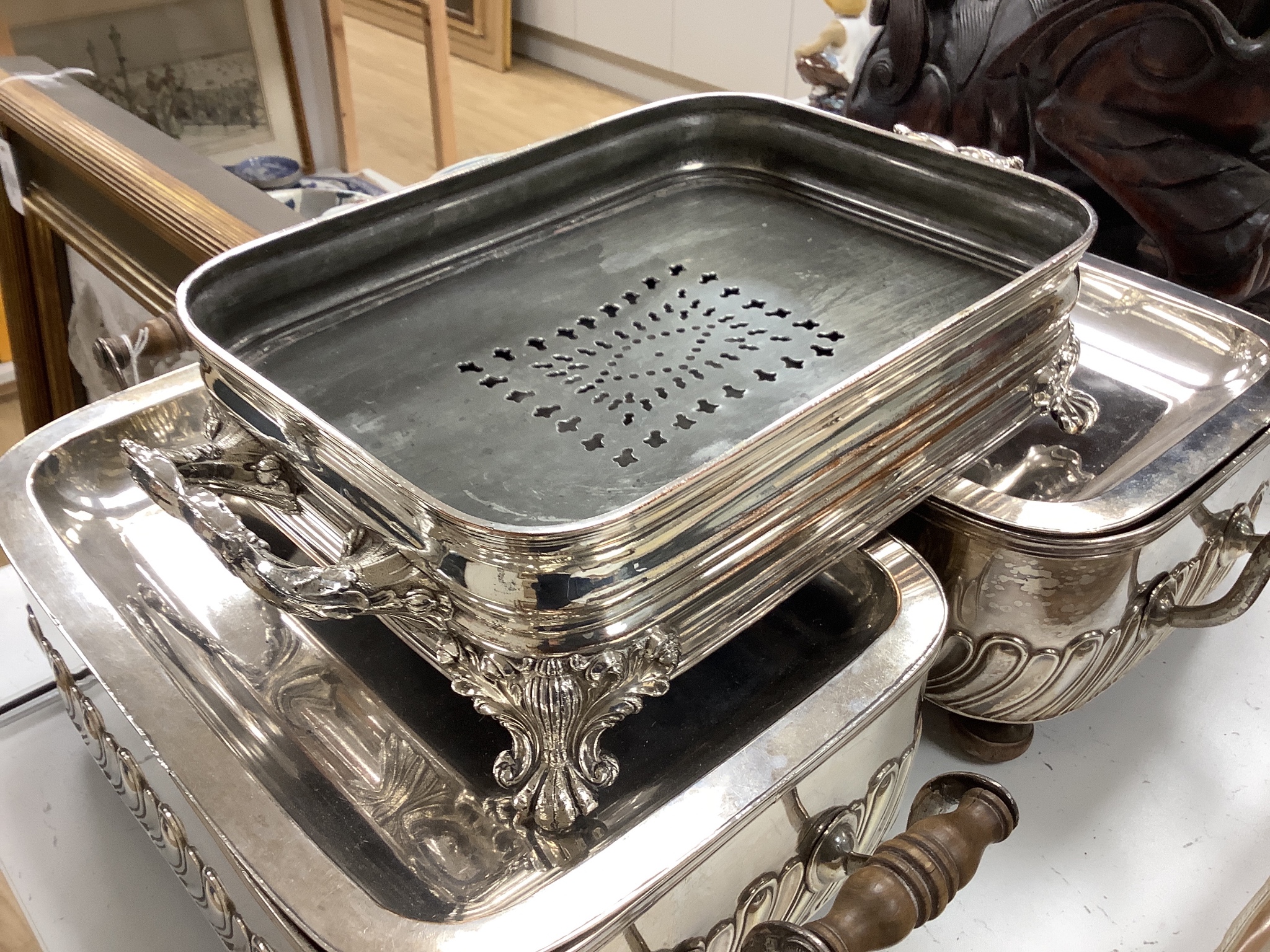 A pair of old Sheffield plated chafing dishes, width overall 40cm, and another similar dish